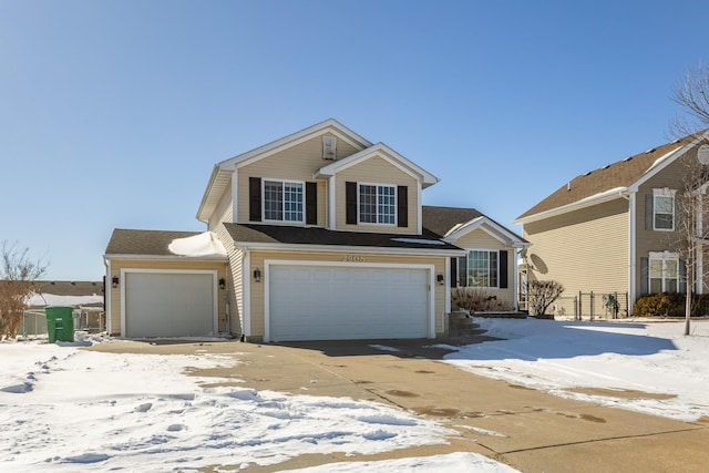 view of front of home featuring driveway and an attached garage