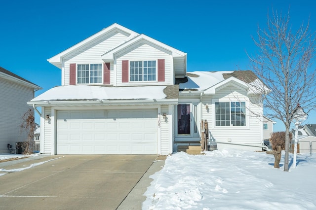 view of front facade featuring a garage and concrete driveway