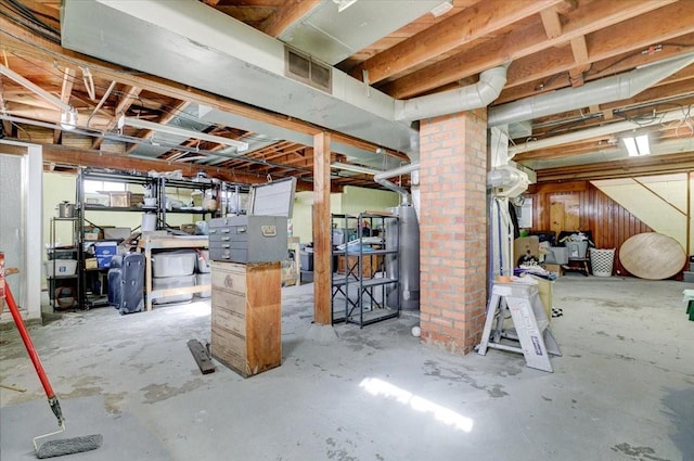 basement featuring gas water heater