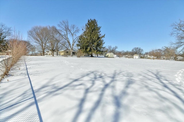 view of snowy yard