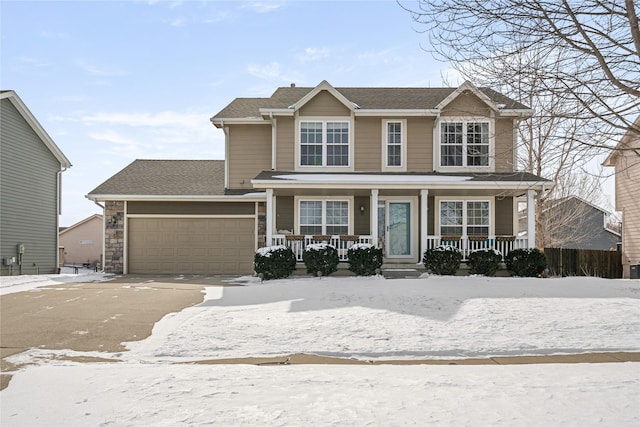 view of front facade featuring a porch, roof with shingles, driveway, and an attached garage