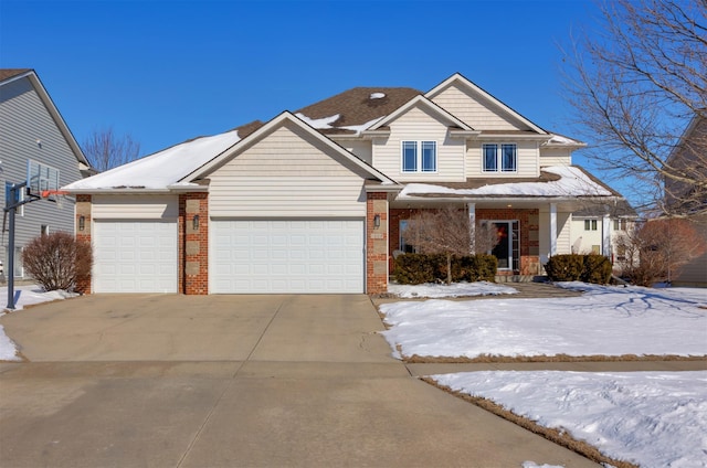 view of front of home featuring a porch, concrete driveway, brick siding, and an attached garage