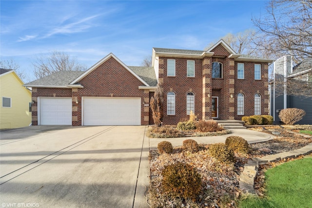 view of front facade with an attached garage, driveway, roof with shingles, and brick siding