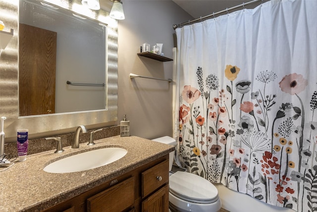 full bathroom featuring vanity, toilet, and shower / bath combo with shower curtain