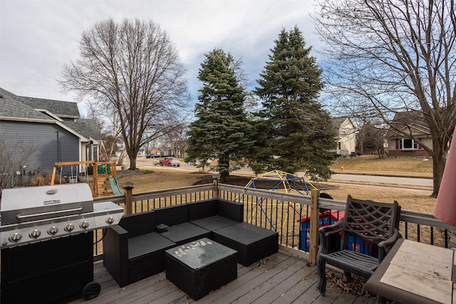 wooden terrace with a residential view, an outdoor hangout area, a playground, and area for grilling