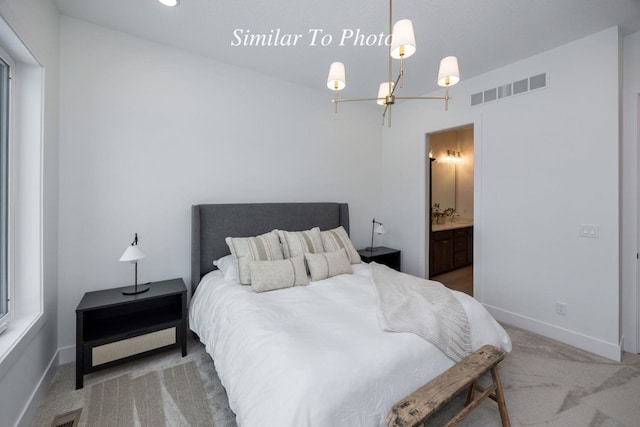 carpeted bedroom with baseboards, visible vents, and a notable chandelier