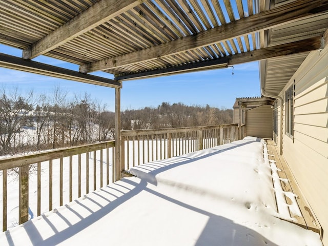 view of snow covered deck