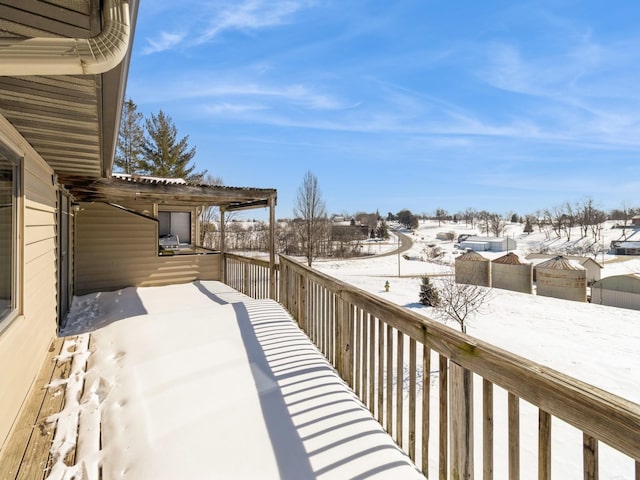 view of snow covered deck