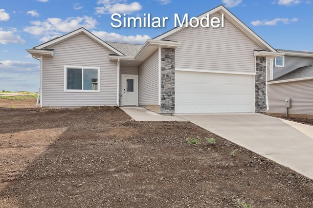 ranch-style house with stone siding and driveway