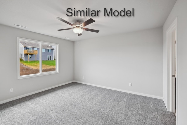 carpeted spare room featuring a ceiling fan, visible vents, and baseboards