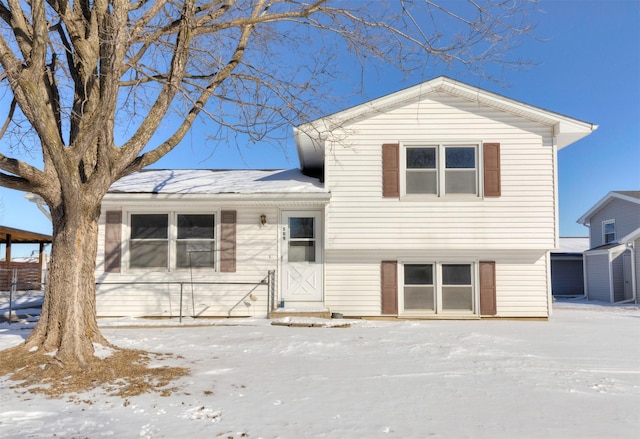 tri-level home featuring entry steps