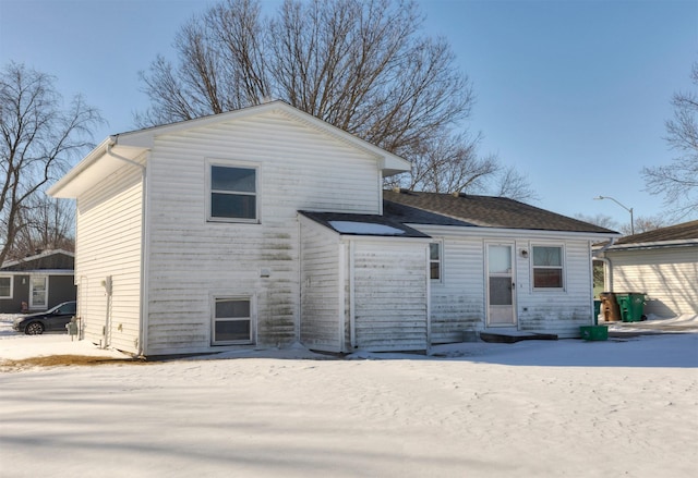 view of snow covered house