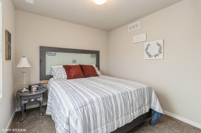 bedroom featuring carpet flooring, visible vents, and baseboards