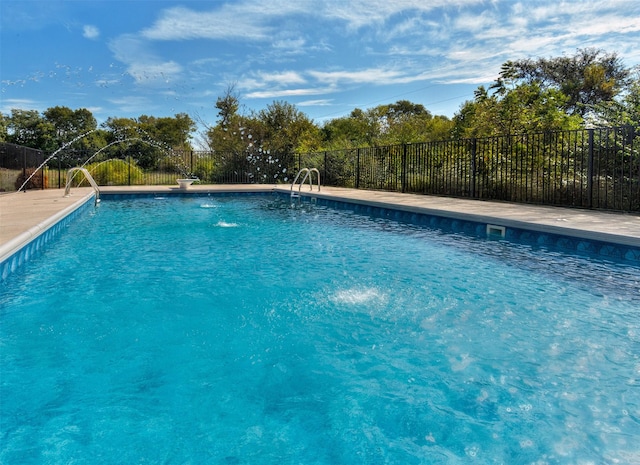 view of pool featuring a fenced in pool and fence