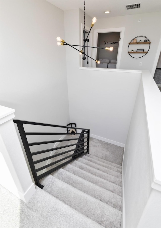 stairs with recessed lighting, carpet flooring, visible vents, and baseboards