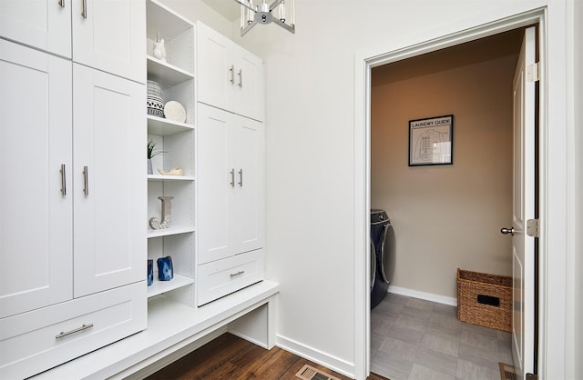 spacious closet featuring washer / clothes dryer