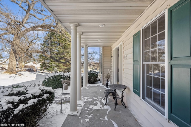 view of snow covered patio