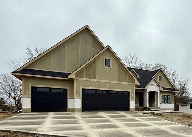 570 El Dorado Ct, Waukee, IA 50263 - view of front of property with driveway and a garage