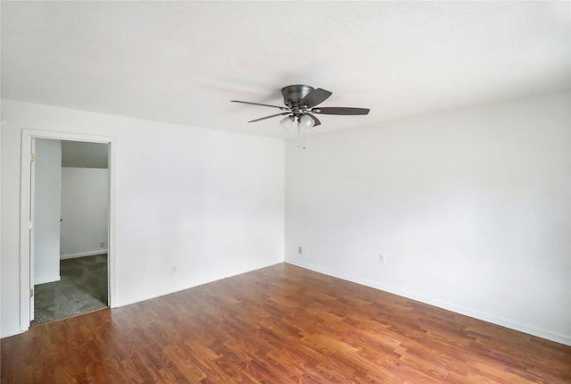 unfurnished room with ceiling fan and wood finished floors