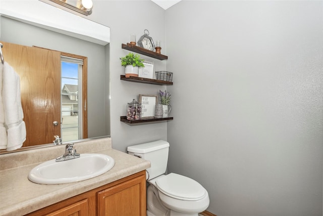 half bath with toilet and vanity