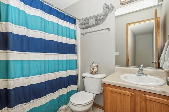 bathroom with toilet, curtained shower, and vanity