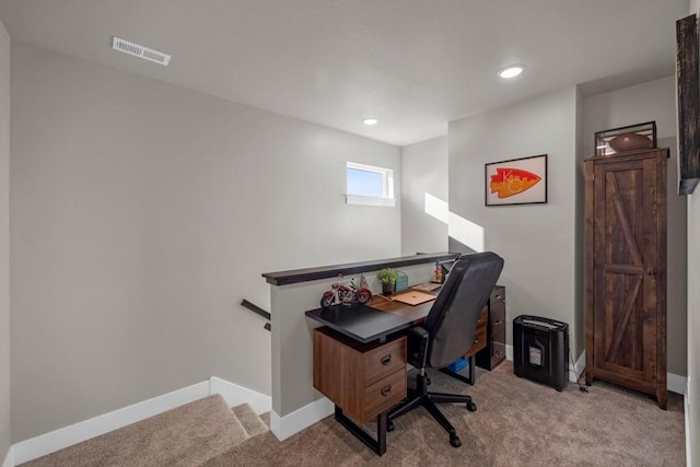 office featuring recessed lighting, visible vents, light carpet, and baseboards