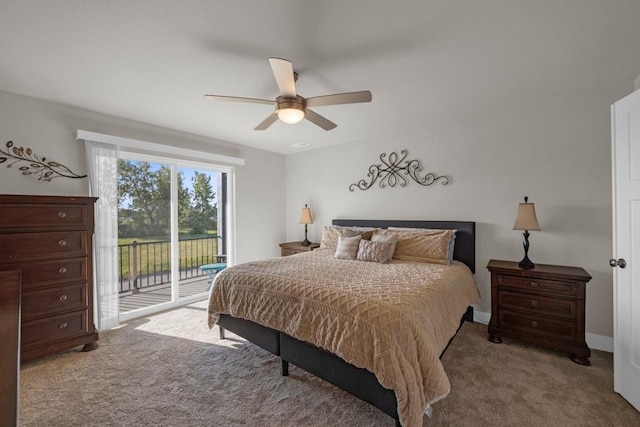 bedroom with baseboards, a ceiling fan, light colored carpet, and access to exterior