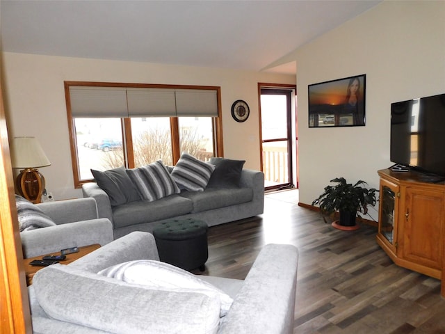 living area with lofted ceiling and dark wood-style flooring