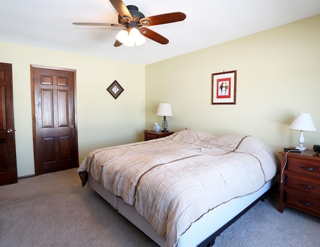 bedroom with carpet floors and a ceiling fan