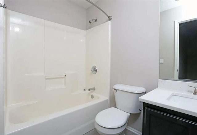 bathroom with toilet, vanity, and shower / bathing tub combination