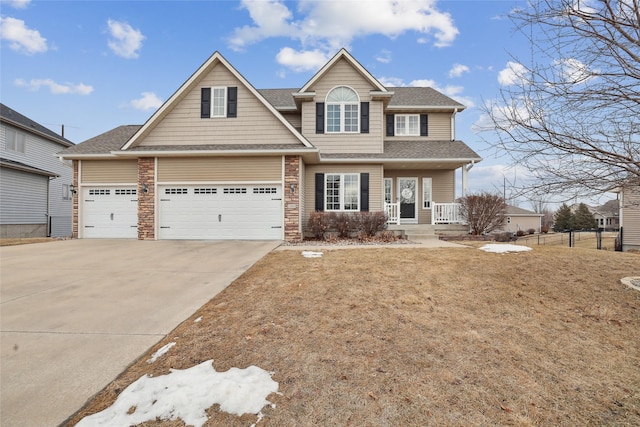 view of front of property featuring a shingled roof, fence, a porch, concrete driveway, and stone siding