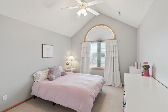 bedroom featuring a ceiling fan, lofted ceiling, light carpet, and baseboards