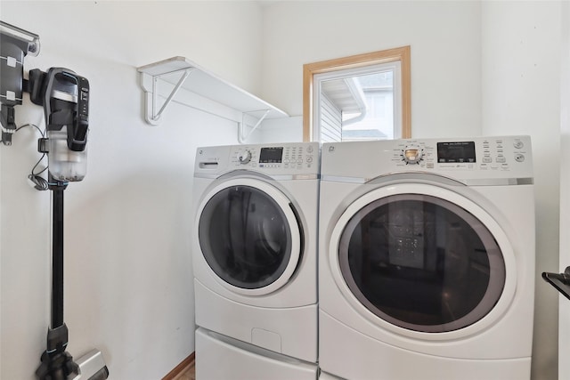 laundry room with laundry area and washing machine and dryer