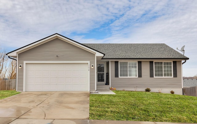 ranch-style house featuring a shingled roof, an attached garage, fence, driveway, and a front lawn