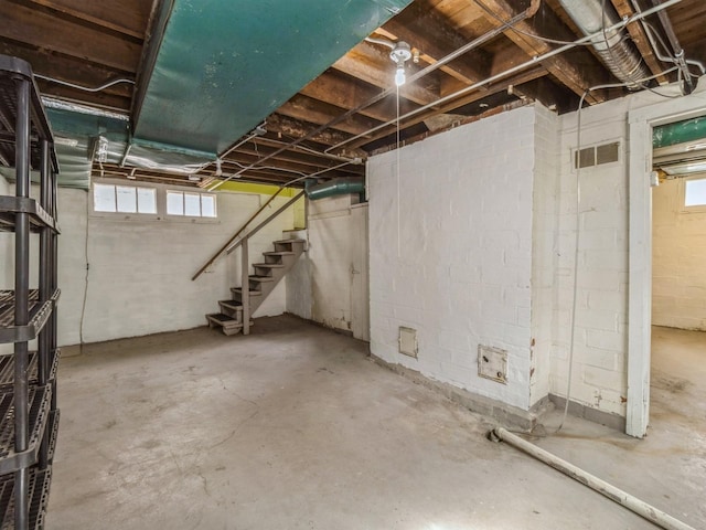 basement with stairway and visible vents