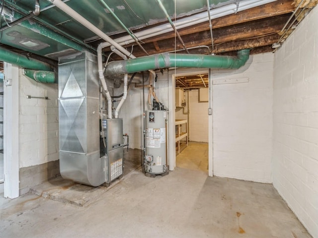 unfinished basement with gas water heater and heating unit