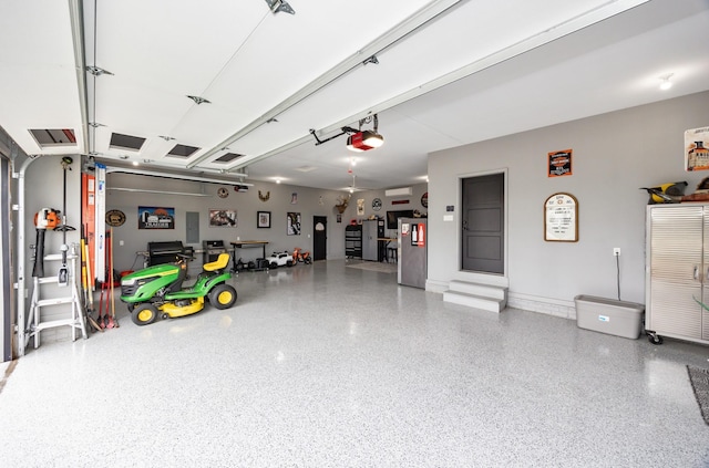 garage featuring baseboards and a garage door opener