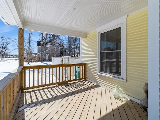 view of snow covered deck