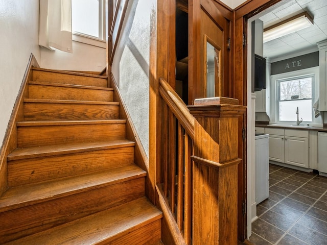 stairway featuring tile patterned floors