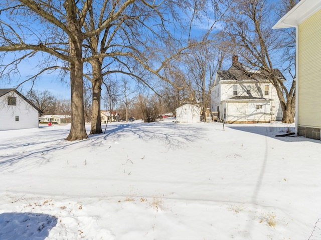 view of snowy yard