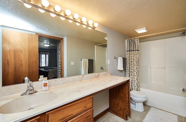 full bathroom with a textured ceiling, tile patterned flooring, toilet, vanity, and visible vents