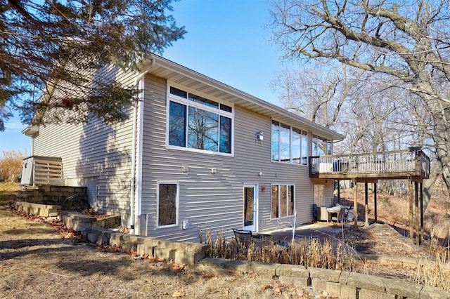 rear view of house with a deck