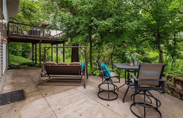 3302 SW Edgewood Ln, Ankeny, IA 50023 - view of patio with a deck and outdoor dining space