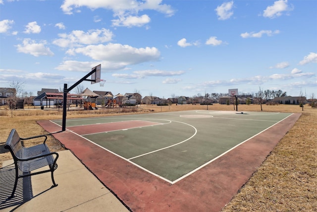 view of sport court with community basketball court and a residential view