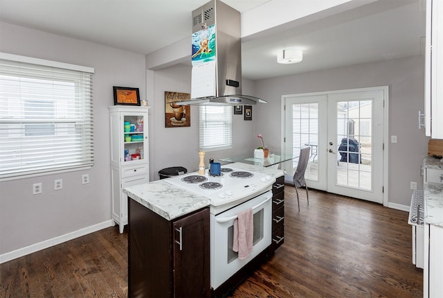 kitchen featuring white electric range, french doors, dark wood-style floors, plenty of natural light, and island exhaust hood