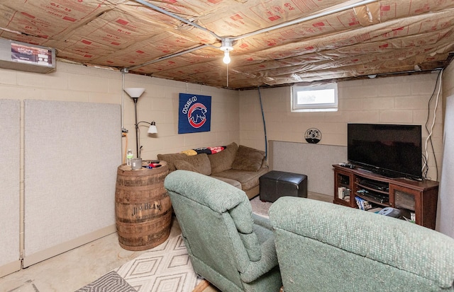 living room featuring concrete flooring