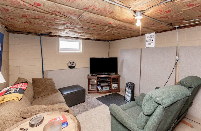 living area with concrete flooring