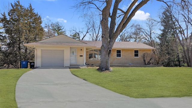 single story home featuring a front yard, brick siding, a garage, and driveway