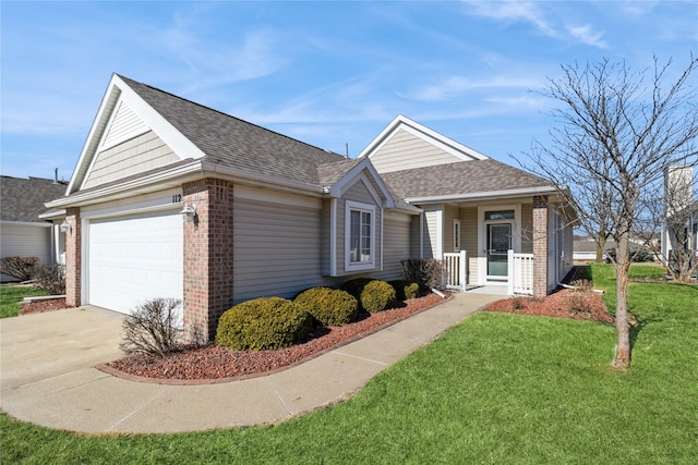 ranch-style house featuring a garage, brick siding, a shingled roof, and a front yard