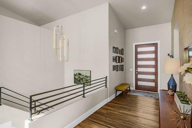 entrance foyer featuring recessed lighting, baseboards, and wood finished floors